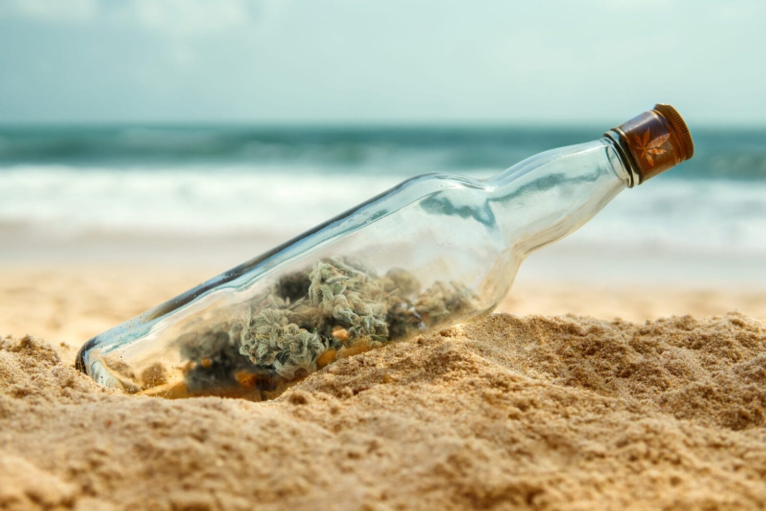 Message in a bottle on the shore of a desert island